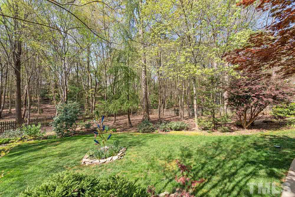 204 Reedham Way Raleigh, NC 27615 - Photo 27 of 30 HUGE backyard with markers in the back to see property line.