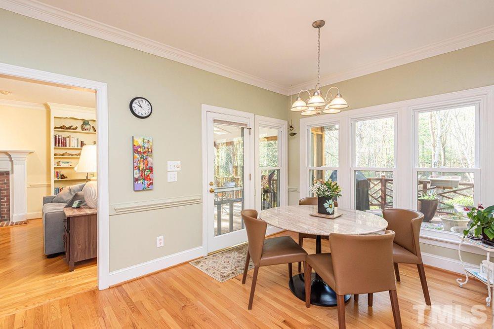 204 Reedham Way Raleigh, NC 27615 - Photo 6 of 30 Breakfast Nook off Family Room overlooks beautiful backyard and screen porch.