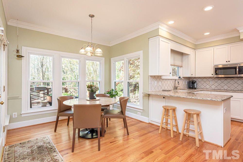 204 Reedham Way Raleigh, NC 27615 - Photo 7 of 30 Lots of windows allow for natural light through out the day.