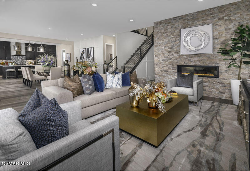 6516 Canyon Oaks Drive Simi Valley, CA 93063 - Photo 9 of 27 a living room with furniture and a fireplace