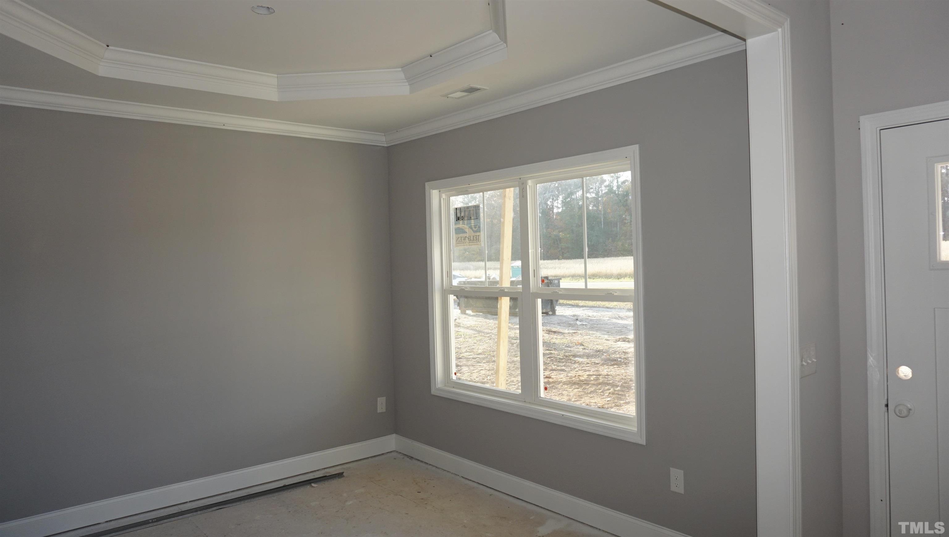 10645 West Old Spring Hope Road Spring Hope, NC 27882 - Photo 3 of 13 a room that has a window in it
