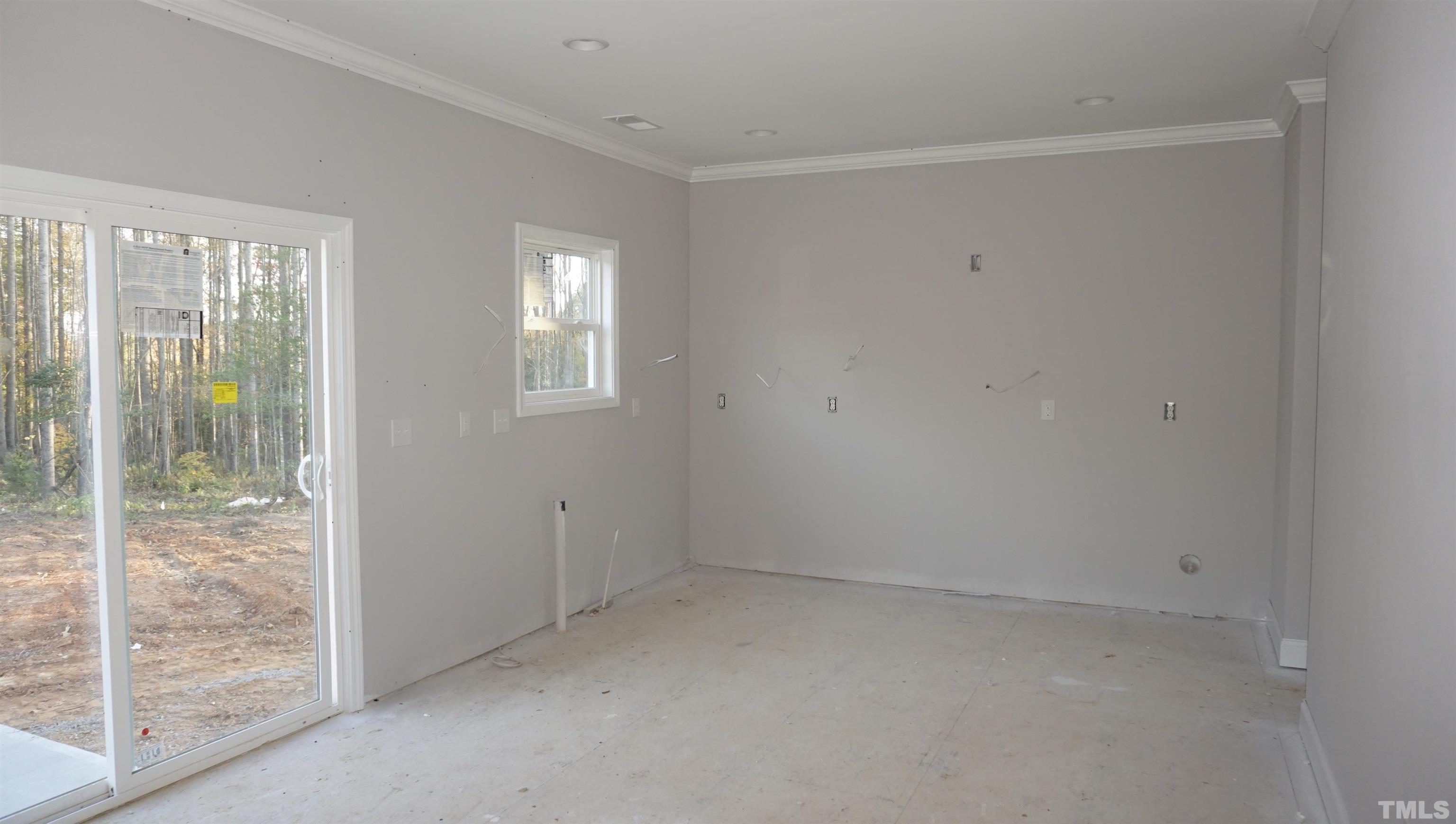 10645 West Old Spring Hope Road Spring Hope, NC 27882 - Photo 5 of 13 an empty room with windows