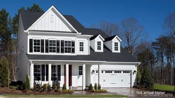 1021 Emory Lane, Unit 68 Fort Mill, SC 29708 - Photo 1 of 6 a front view of a house with a yard