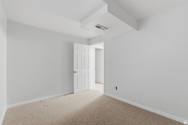 148 Tennyson Avenue Sandy, UT 84070 - Photo 38 of 55 Neutral tone walls with white trim and carpeting