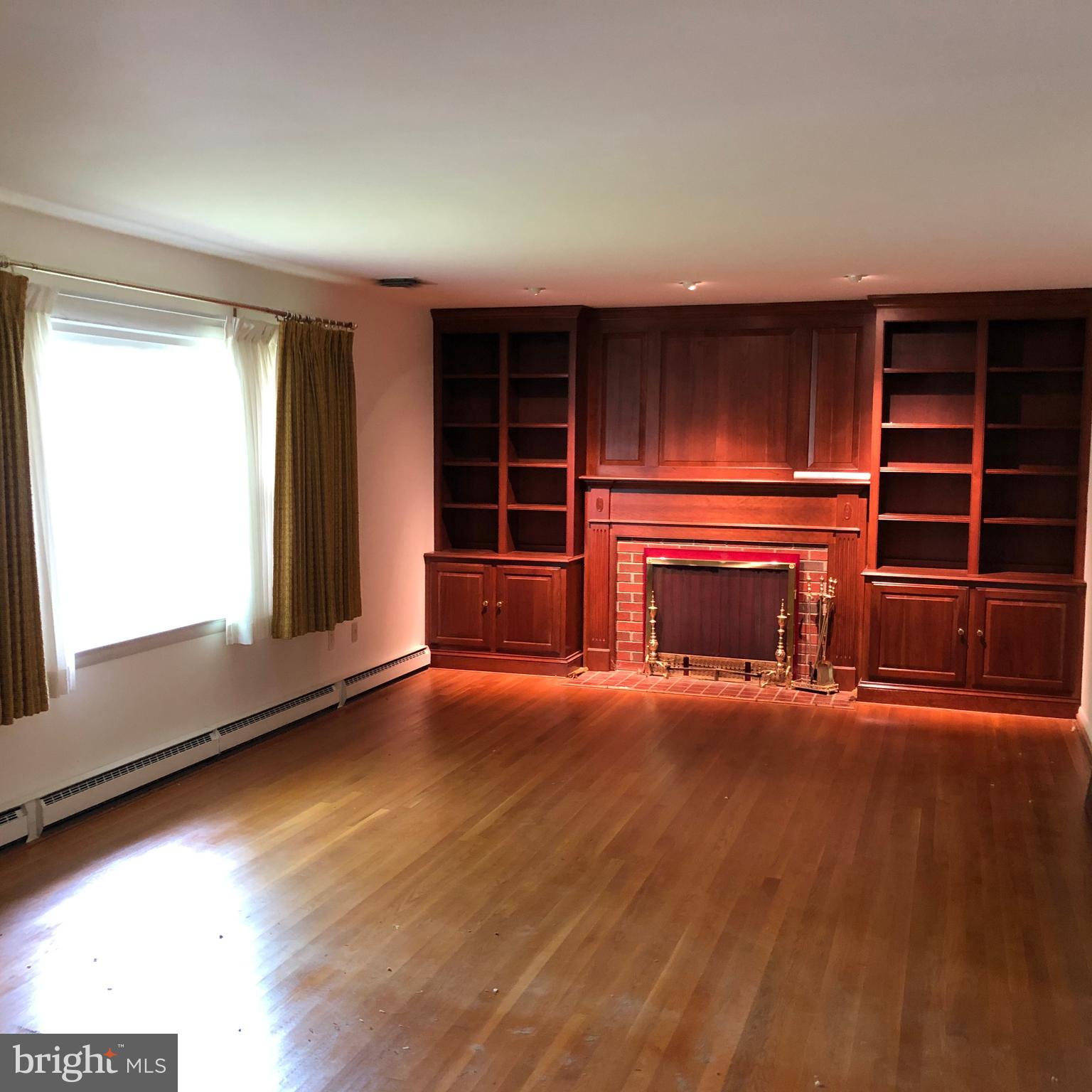 707 Anne Street Southwest Leesburg, VA 20175 - Photo 2 of 14 Large Living Room, Wood Burning Fireplace