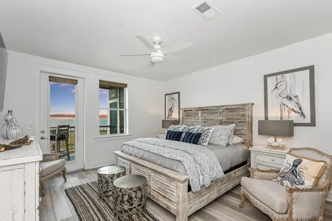 a bedroom with a bed and a couch