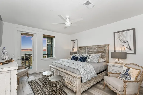 a bedroom with a bed and a couch