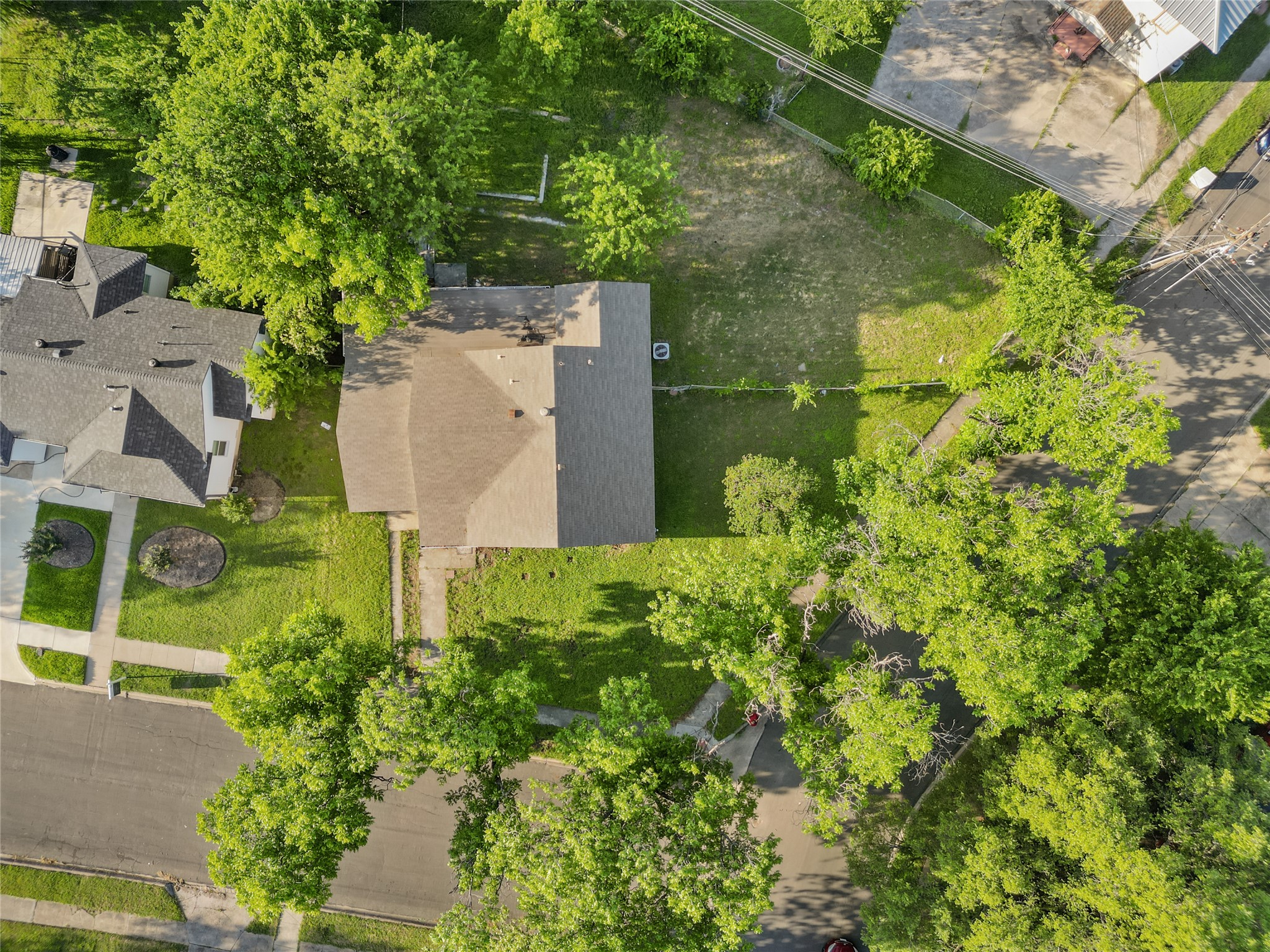 801 Evetts Road Killeen, TX 76541 - Photo 15 of 16 An aerial perspective showcases the property's generous yard space, nestled among mature trees.