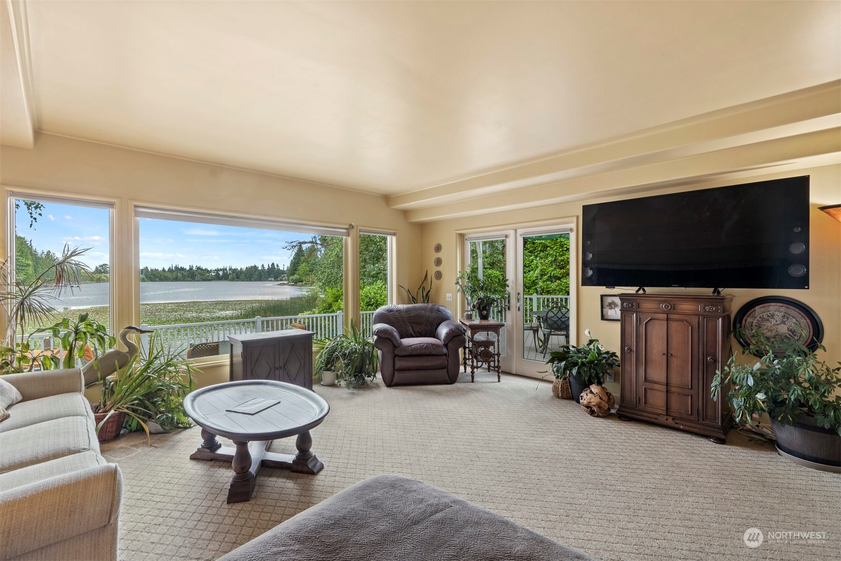 426 Lakeview Road Lynnwood, WA 98087 - Photo 16 of 33 a living room with furniture and a flat screen tv