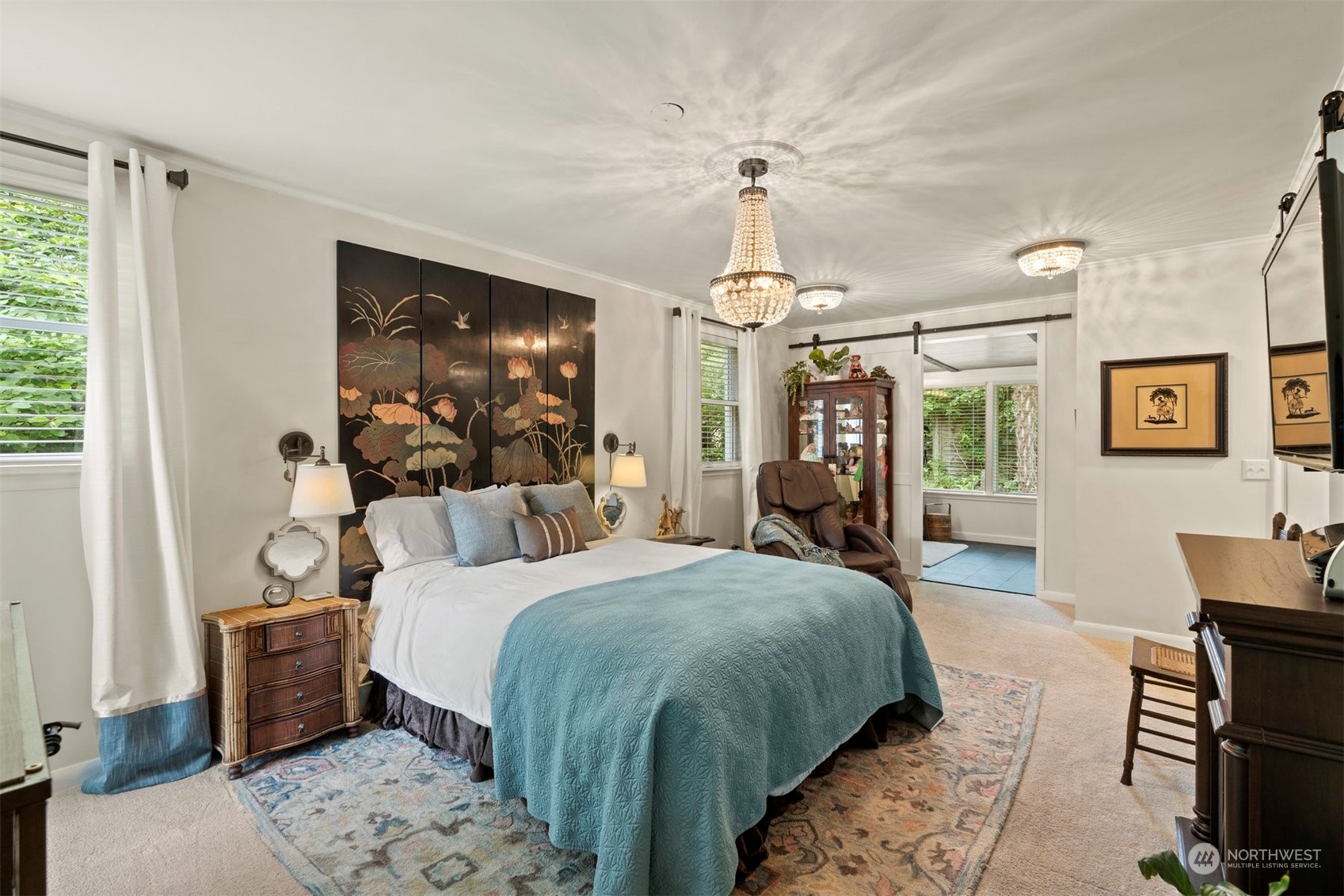 426 Lakeview Road Lynnwood, WA 98087 - Photo 18 of 33 a large bedroom with a bed and wooden floor