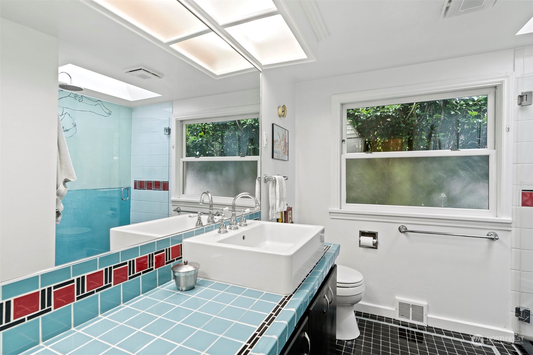 426 Lakeview Road Lynnwood, WA 98087 - Photo 21 of 33 a bathroom with a sink toilet and a window