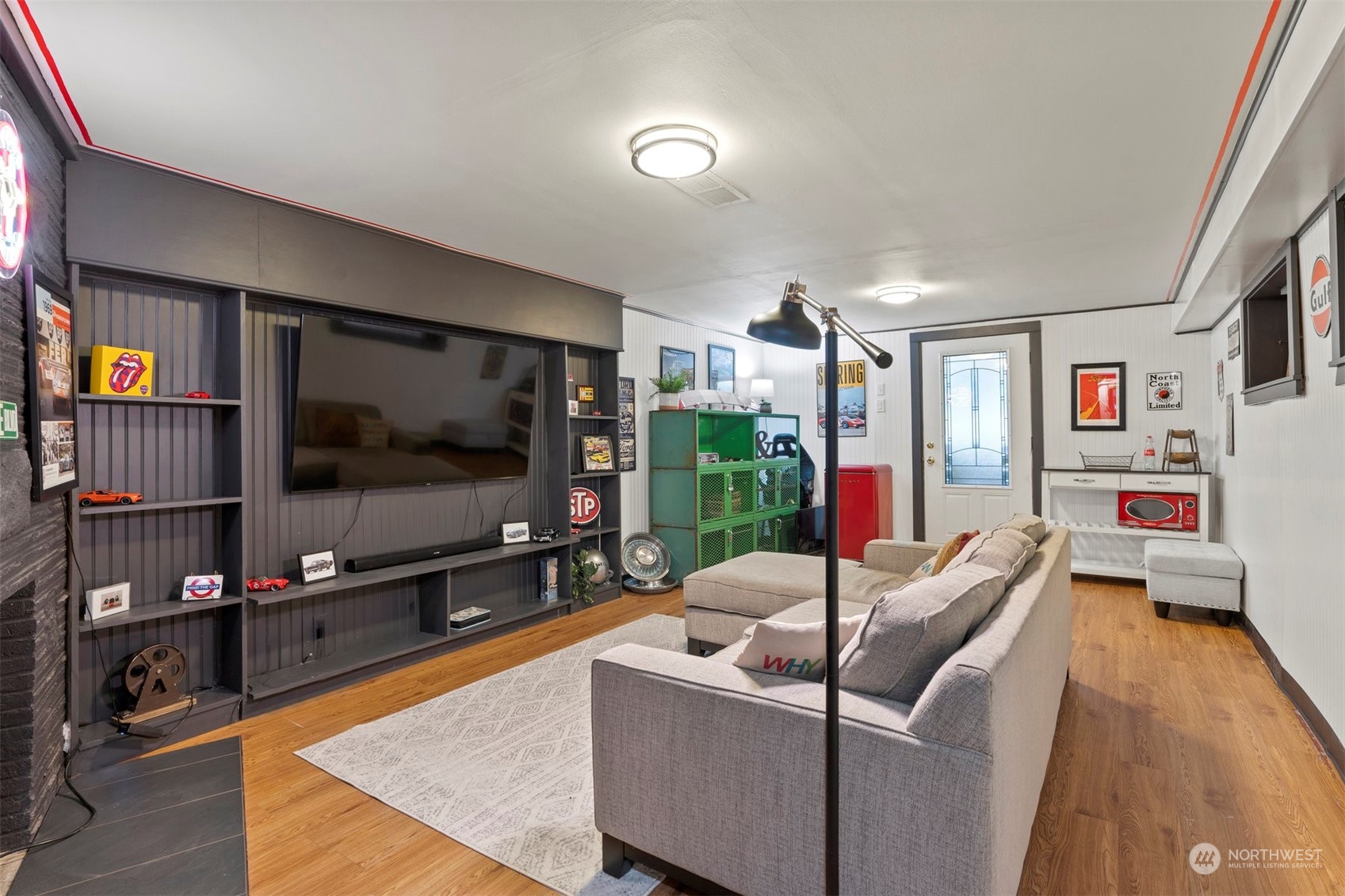 426 Lakeview Road Lynnwood, WA 98087 - Photo 24 of 33 a living room with furniture and a flat screen tv