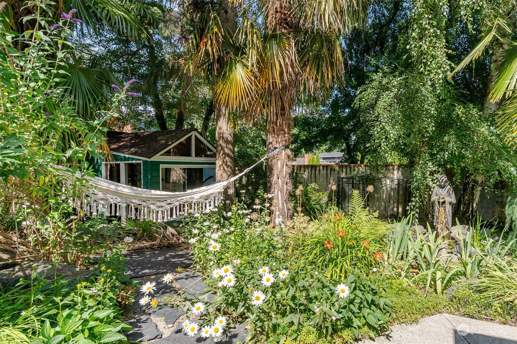 426 Lakeview Road Lynnwood, WA 98087 - Photo 29 of 33 a yellow house with trees in front of it