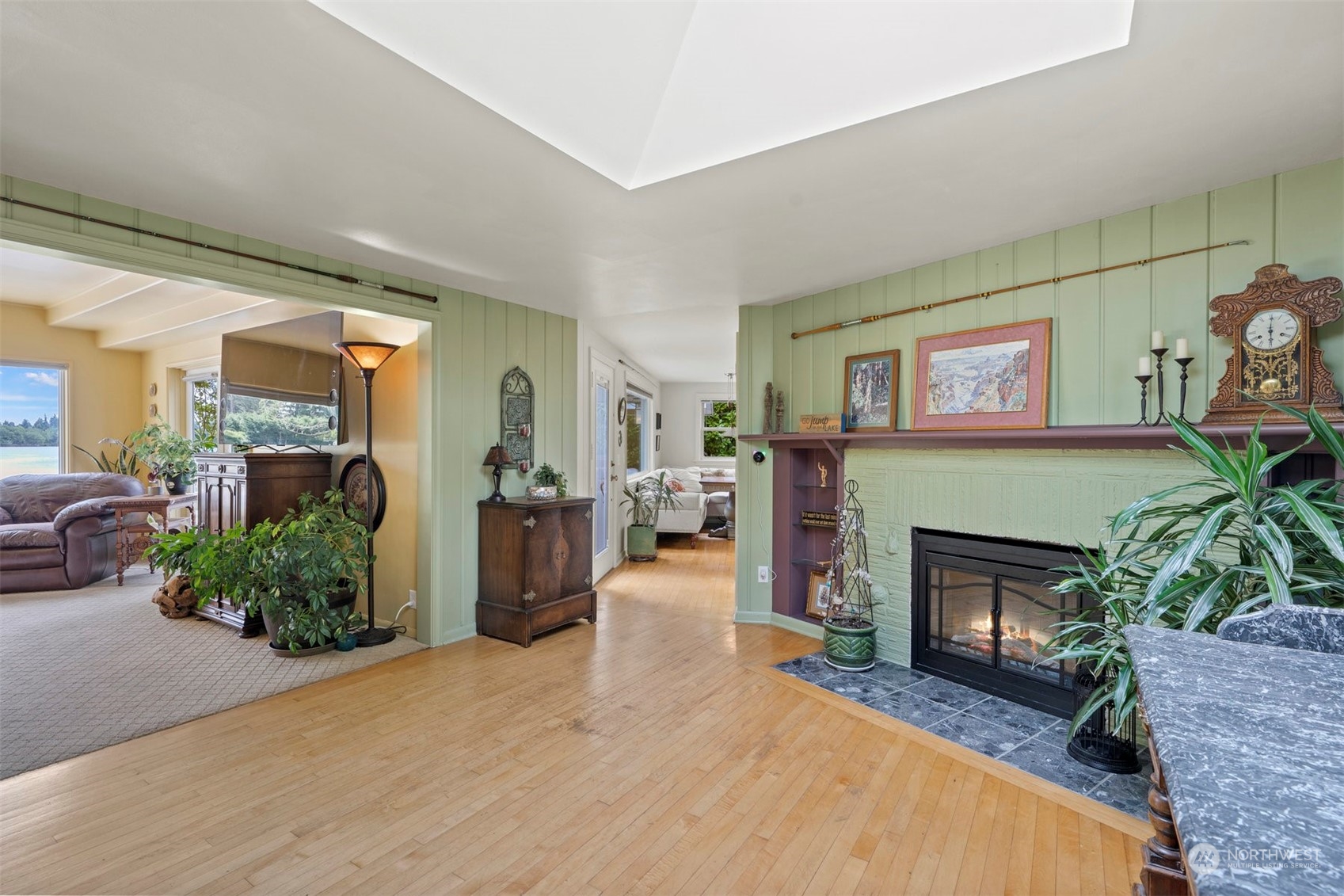 426 Lakeview Road Lynnwood, WA 98087 - Photo 10 of 33 a living room with furniture and a fireplace
