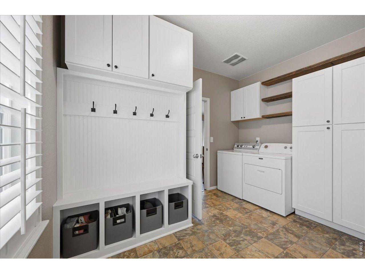 6096 Story Road Timnath, CO 80547 - Photo 33 of 50 a kitchen with cabinets and window