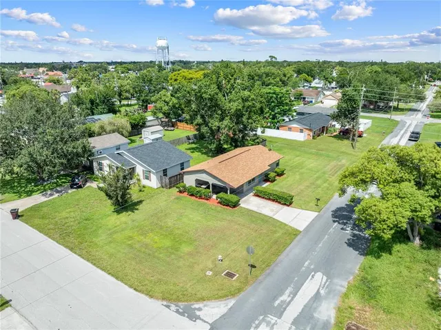 a view of a garden with an outdoor space