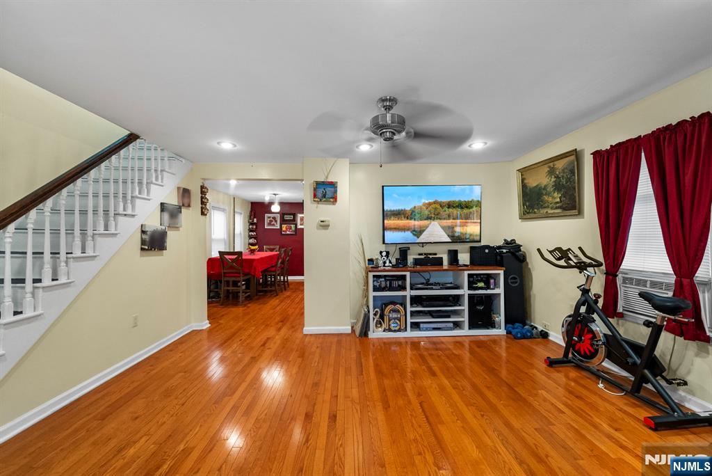 298 3rd Street Hackensack, NJ 07601 - Photo 15 of 36 a view of a workspace with furniture and wooden floor