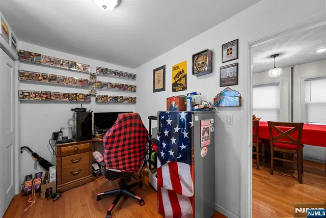 a room with furniture and wooden floor