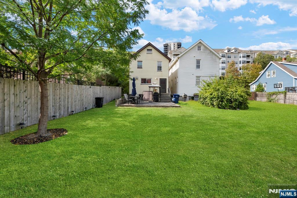 298 3rd Street Hackensack, NJ 07601 - Photo 35 of 36 a view of a house with backyard and sitting area