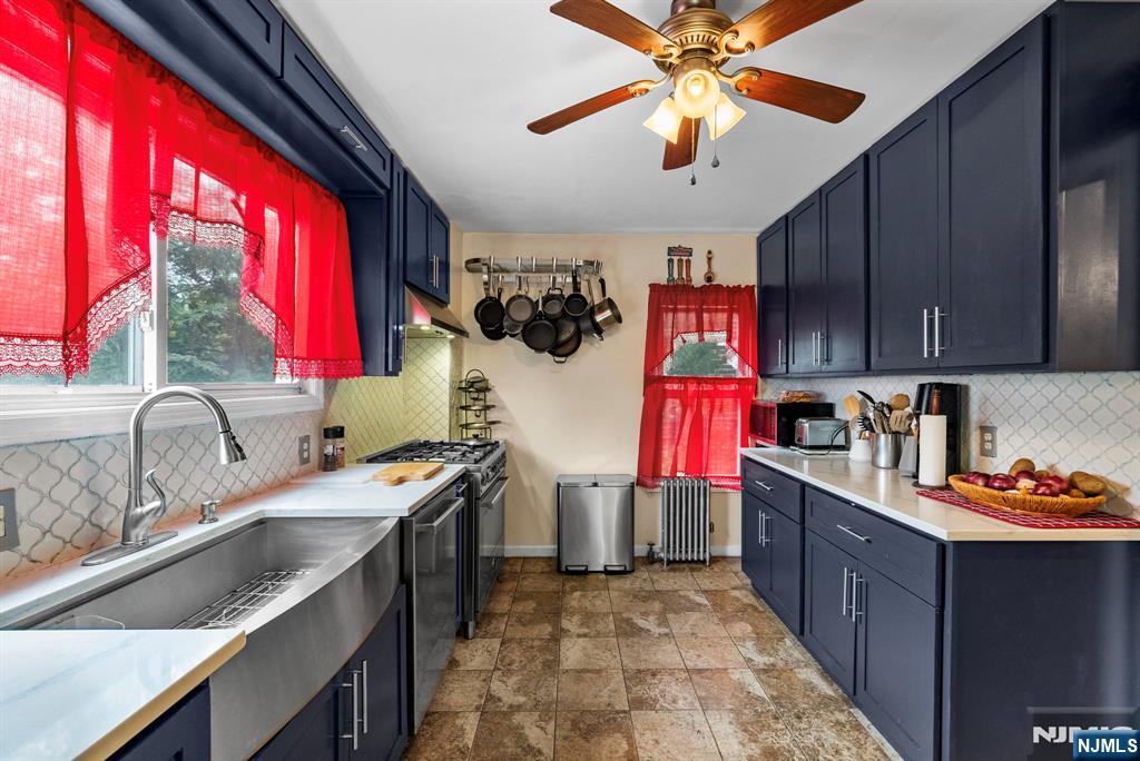 298 3rd Street Hackensack, NJ 07601 - Photo 7 of 36 a kitchen that has a lot of cabinets in it