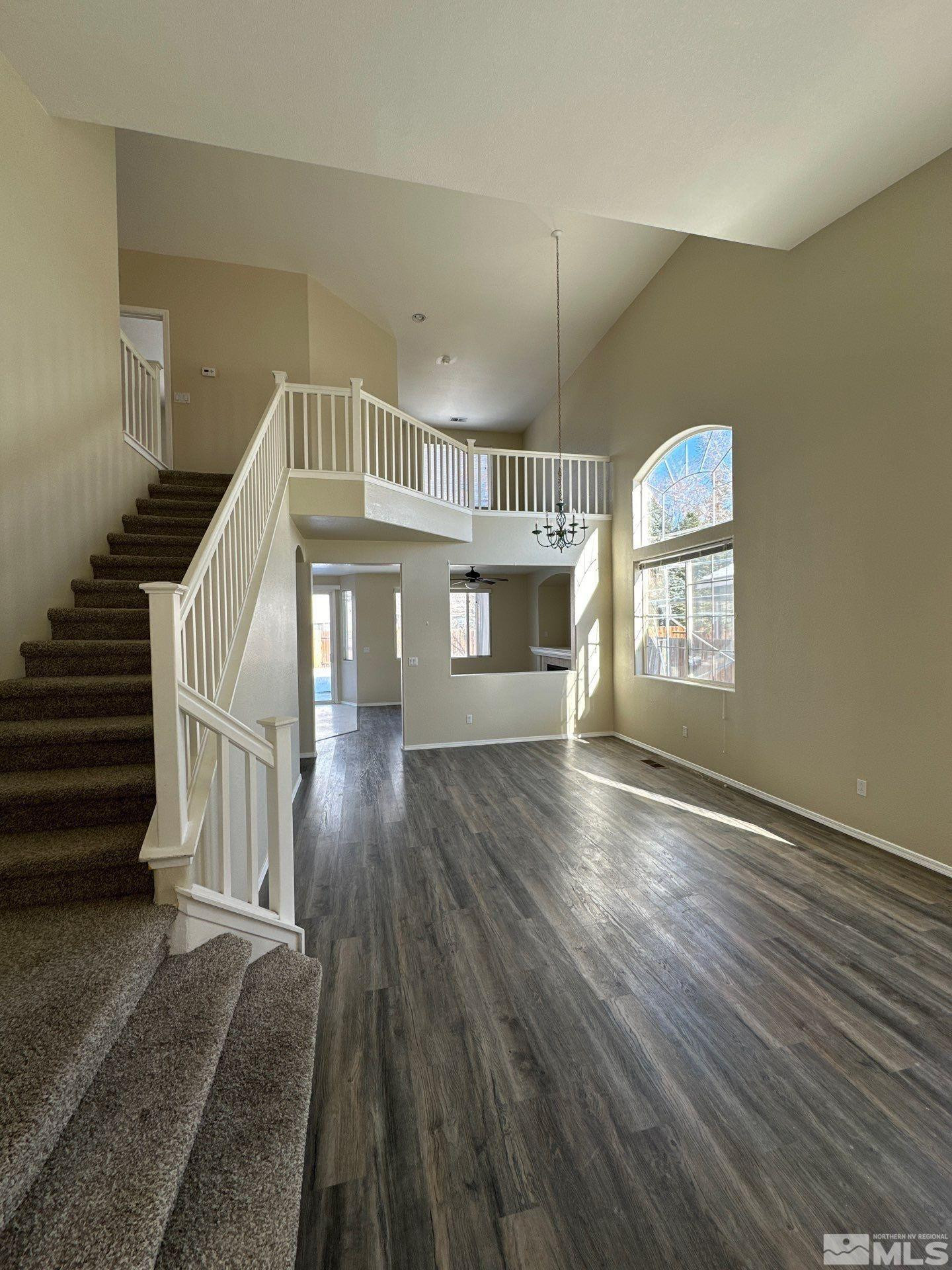 9648 Thunder Mountain Way Reno, NV 89521 - Photo 2 of 27 a view of entryway and hall with wooden floor