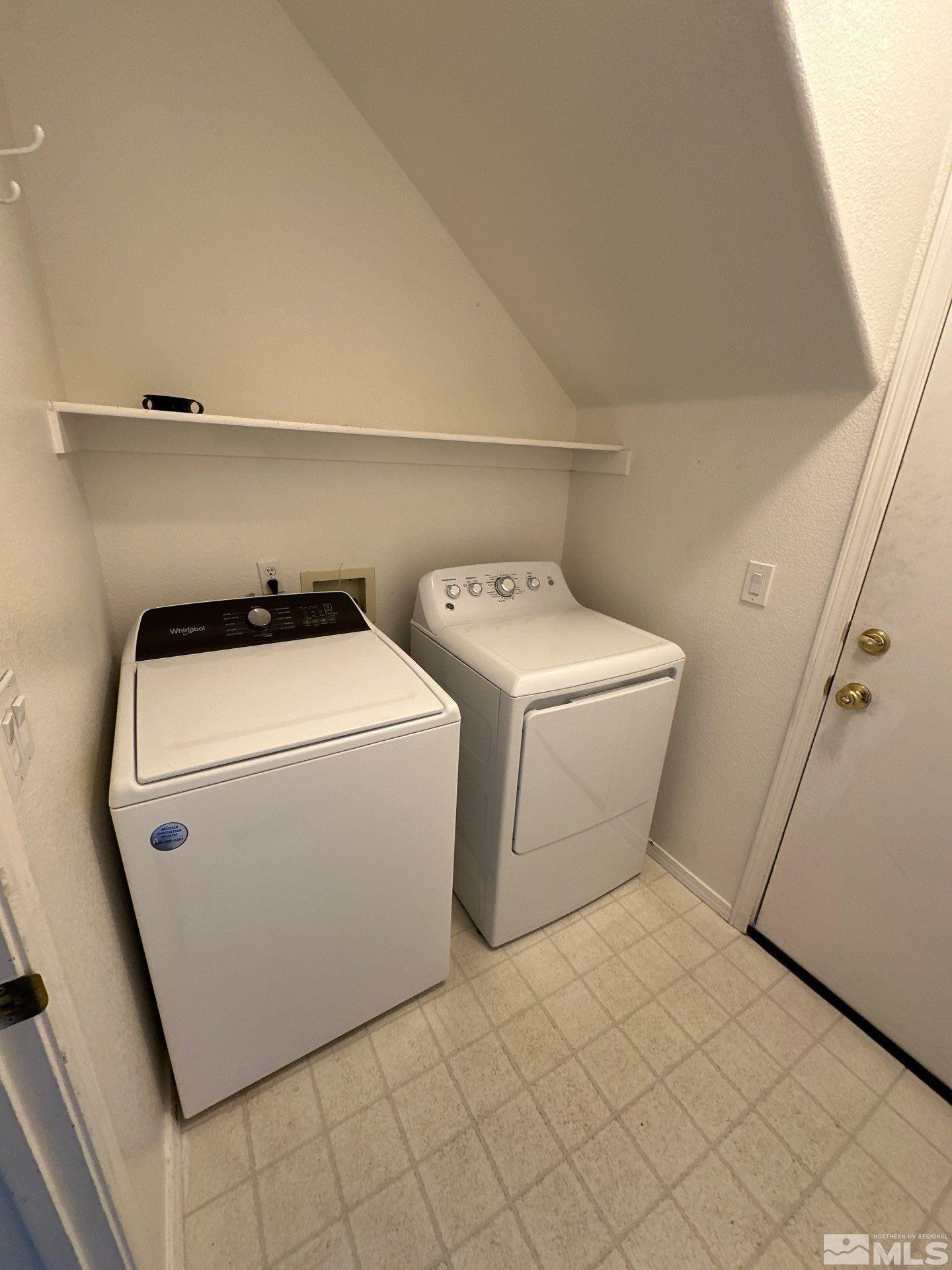 9648 Thunder Mountain Way Reno, NV 89521 - Photo 26 of 27 a utility room with dryer and washer