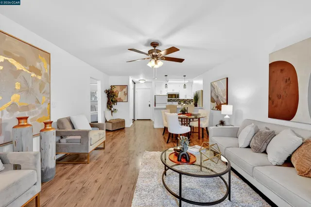 a bedroom with furniture and a lamp