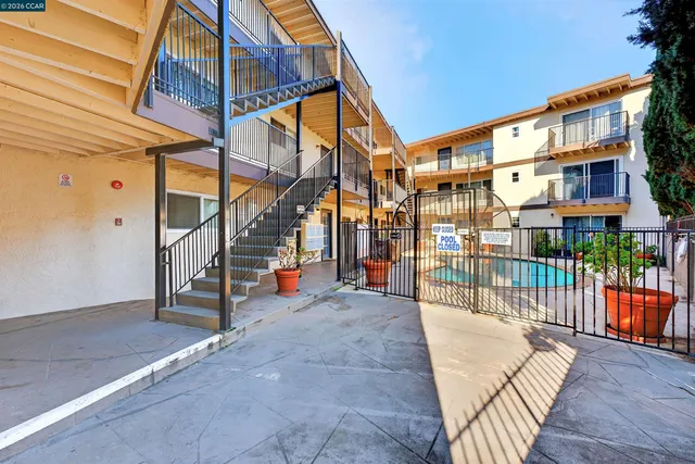 a view of balcony with furniture
