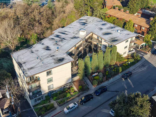 front view of a house with a backyard