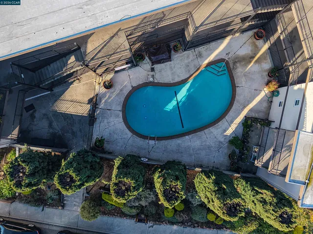 an aerial view of a house with a mountain view