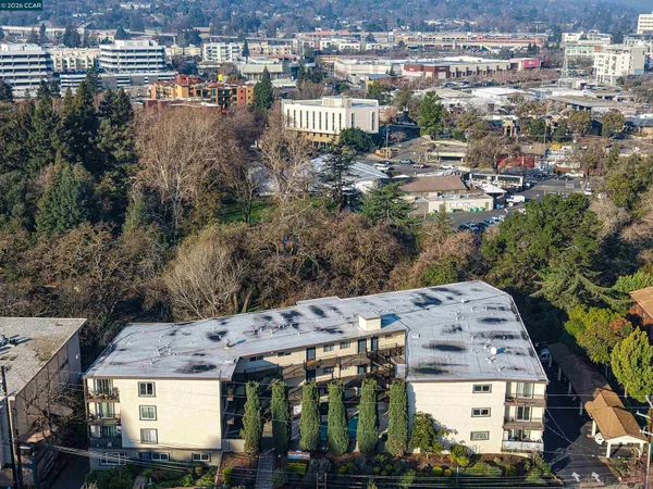 a front view of a building with garden