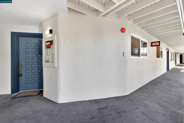 a kitchen with sink stove and cabinets