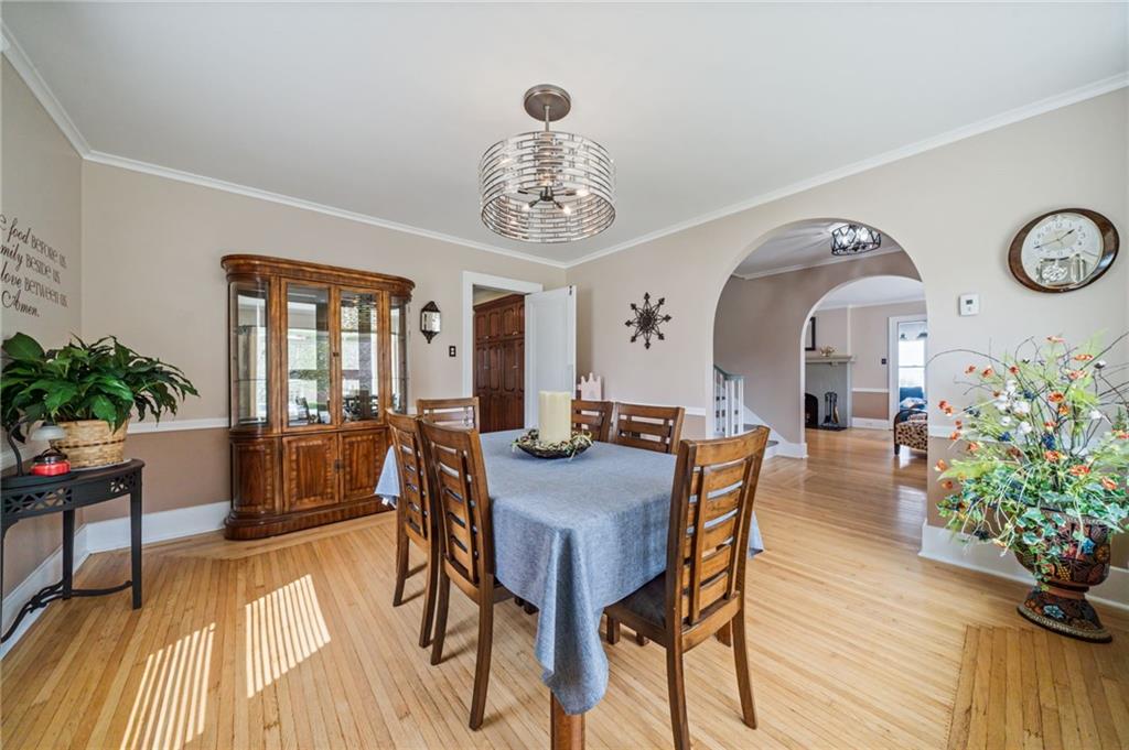 111 Orchard Avenue Rostraver Township, PA 15012 - Photo 11 of 42 a view of a dining room with furniture and wooden floor