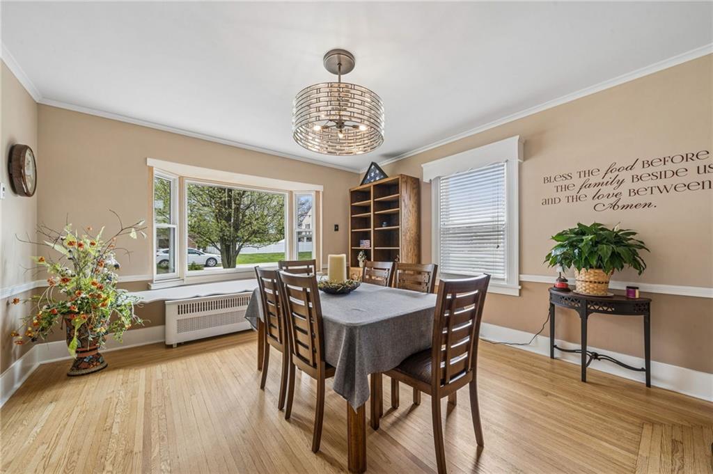111 Orchard Avenue Rostraver Township, PA 15012 - Photo 12 of 42 a view of a dining room with furniture window and wooden floor
