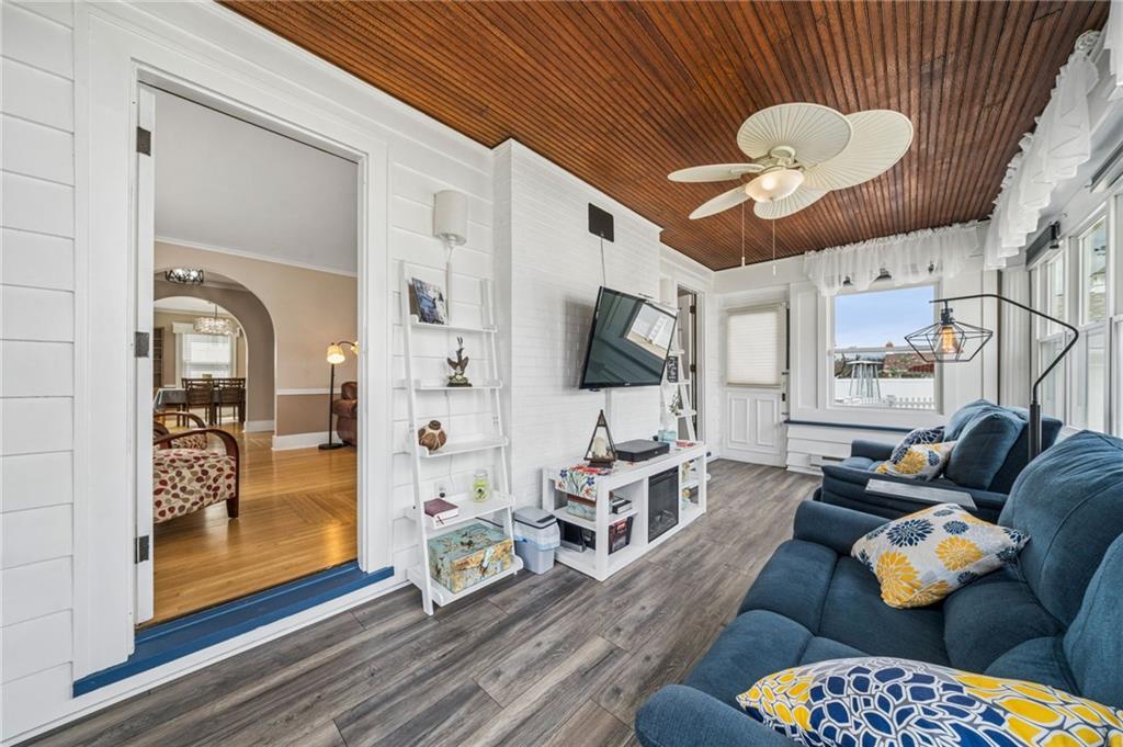111 Orchard Avenue Rostraver Township, PA 15012 - Photo 18 of 42 a living room with furniture ceiling fan and a rug
