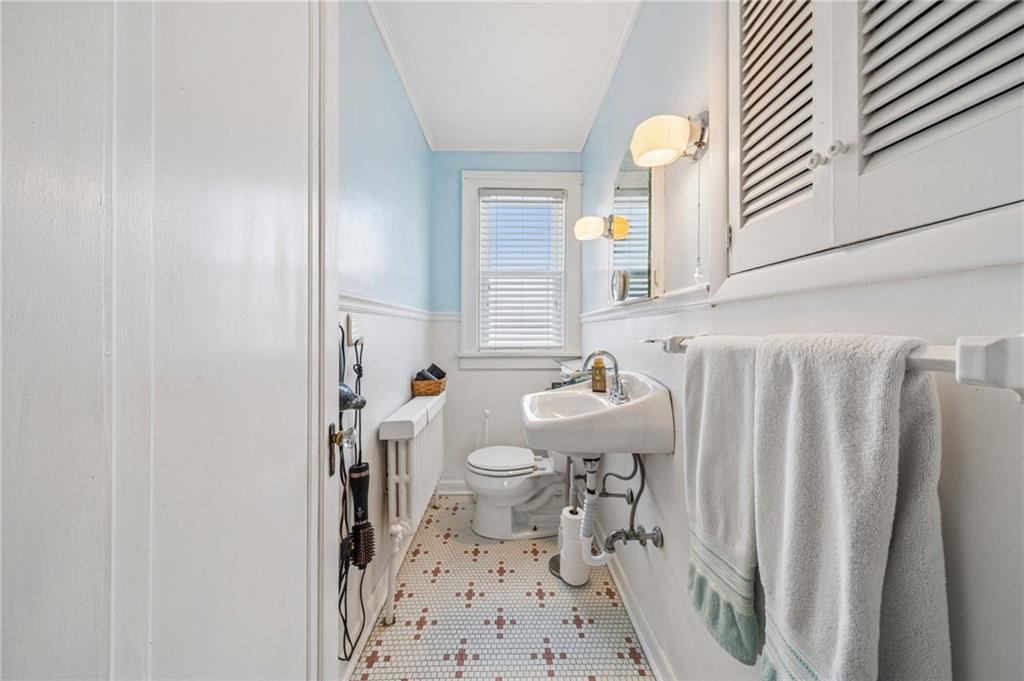 111 Orchard Avenue Rostraver Township, PA 15012 - Photo 22 of 42 a bathroom with a sink a toilet and shower