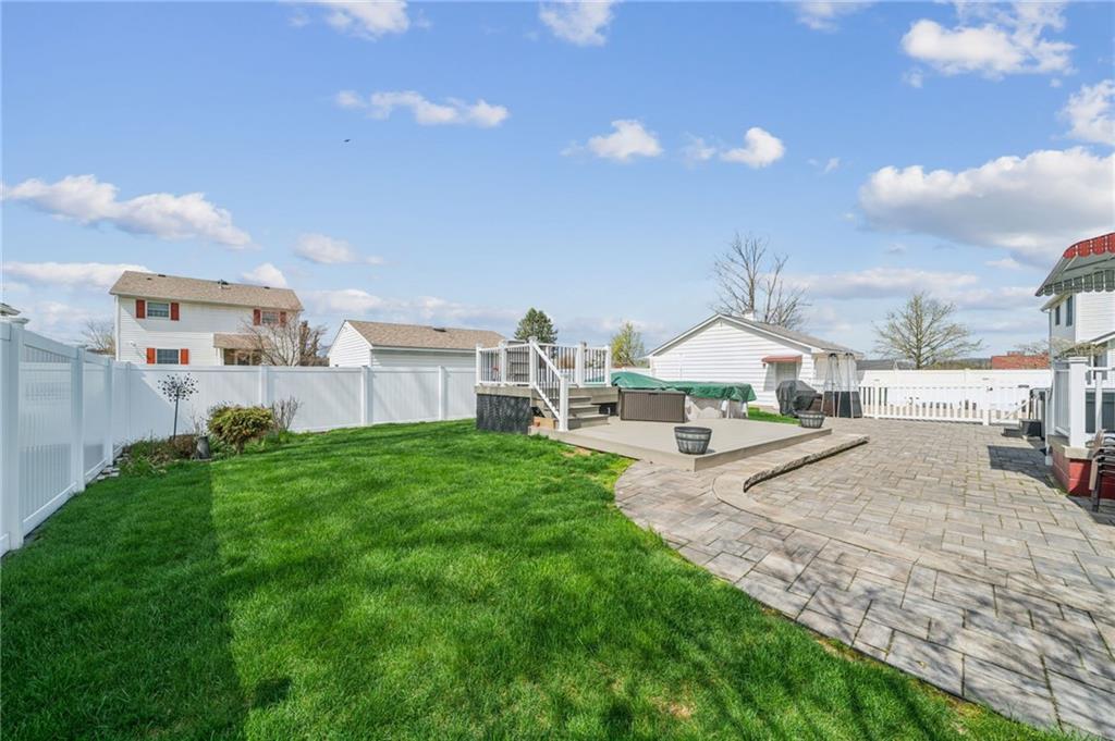 111 Orchard Avenue Rostraver Township, PA 15012 - Photo 31 of 42 a view of a backyard with patio