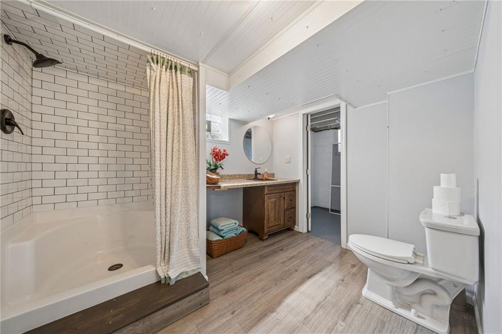 111 Orchard Avenue Rostraver Township, PA 15012 - Photo 32 of 42 a bathroom with a sink a toilet and shower