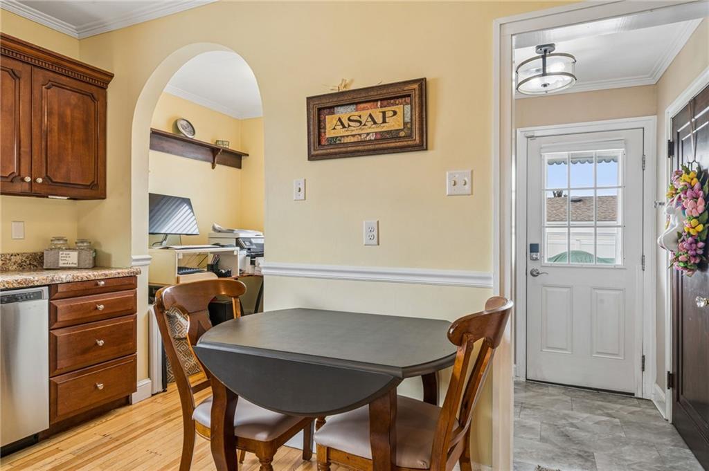 111 Orchard Avenue Rostraver Township, PA 15012 - Photo 9 of 42 a view of a dining room with furniture and wooden floor
