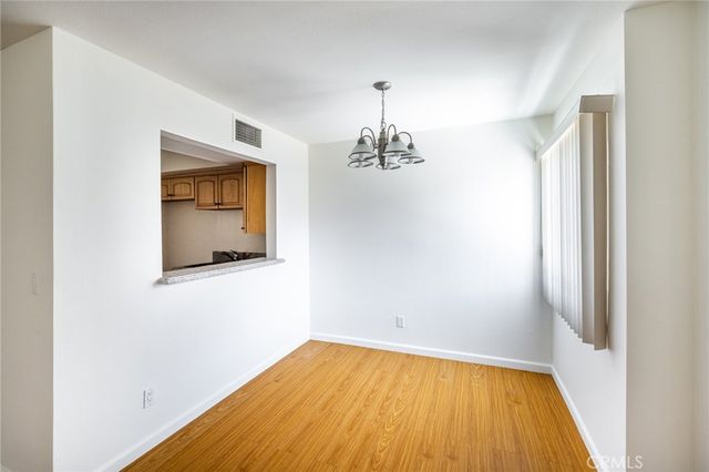 a view of a hallway with a large window