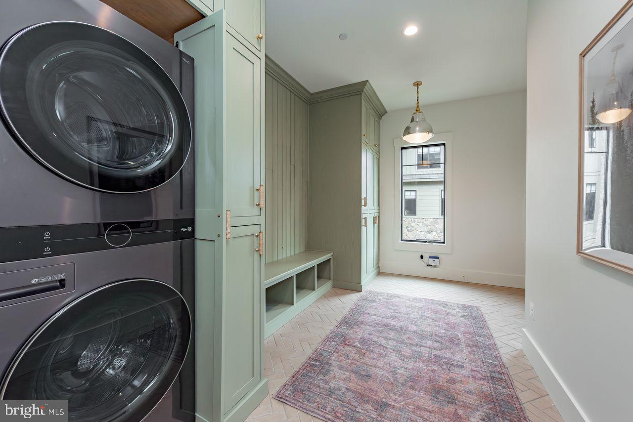 142 Ridge Run Road McHenry, MD 21541 - Photo 27 of 58 a view of a hallway with washer and dryer