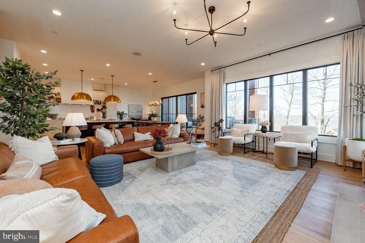 142 Ridge Run Road McHenry, MD 21541 - Photo 3 of 58 a living room with fireplace furniture and a large window