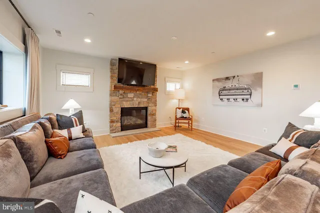 a large living room with furniture