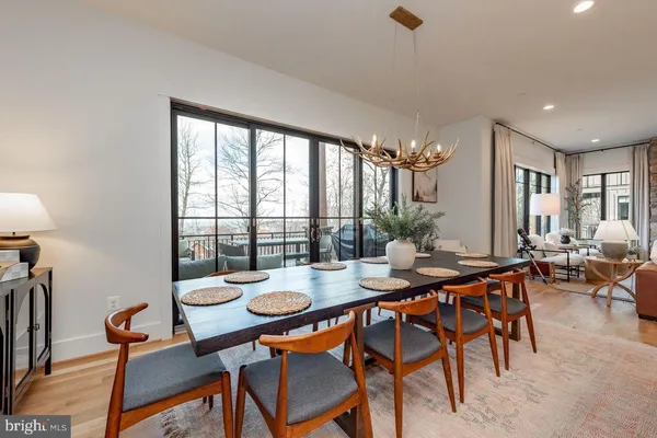 a view of a dining room with furniture window and outside view