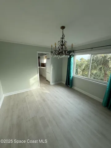 a view of a room with a window