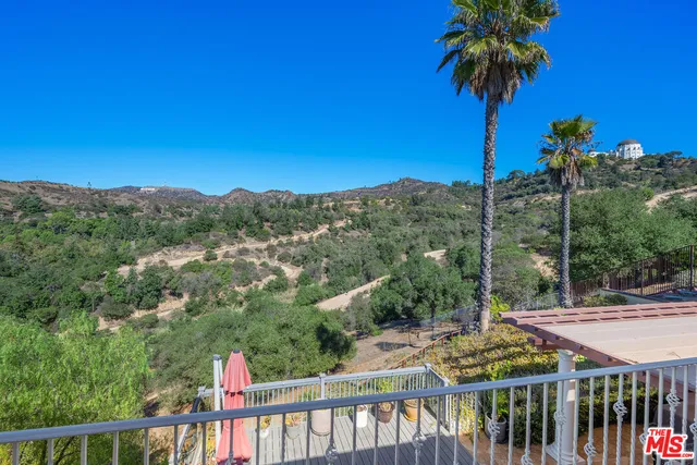 a view of a balcony with mountain view