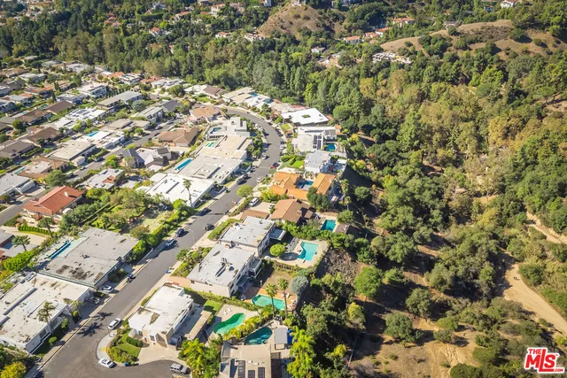 a view of a city with mountain