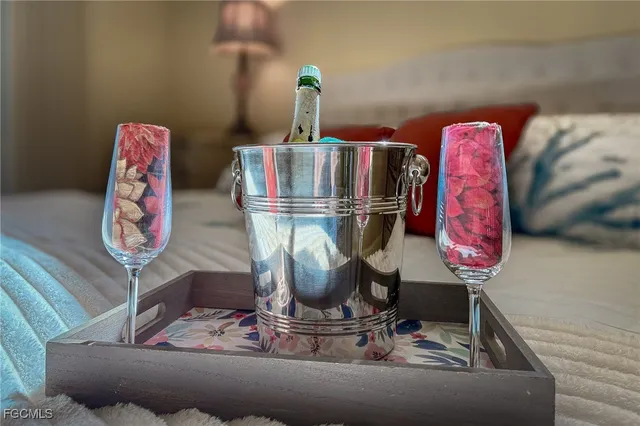 a room with a couch and chandelier