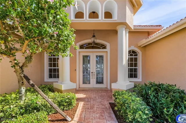 front view of a house with a small yard