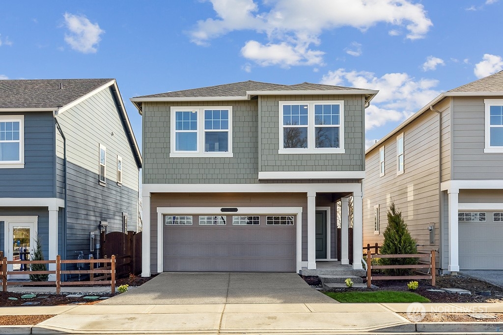 205 17th Drive, Unit WH 46 Snohomish, WA 98290 - Photo 1 of 36 a front view of a house with a garage